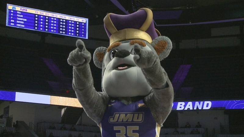 Duke Dog pointing to fans during a timeout in a JMU win over Old Dominion on Feb. 15, 2025.
