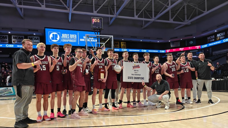 The Luray boys basketball team poses for a team photo after winning the VHSL Class 1...