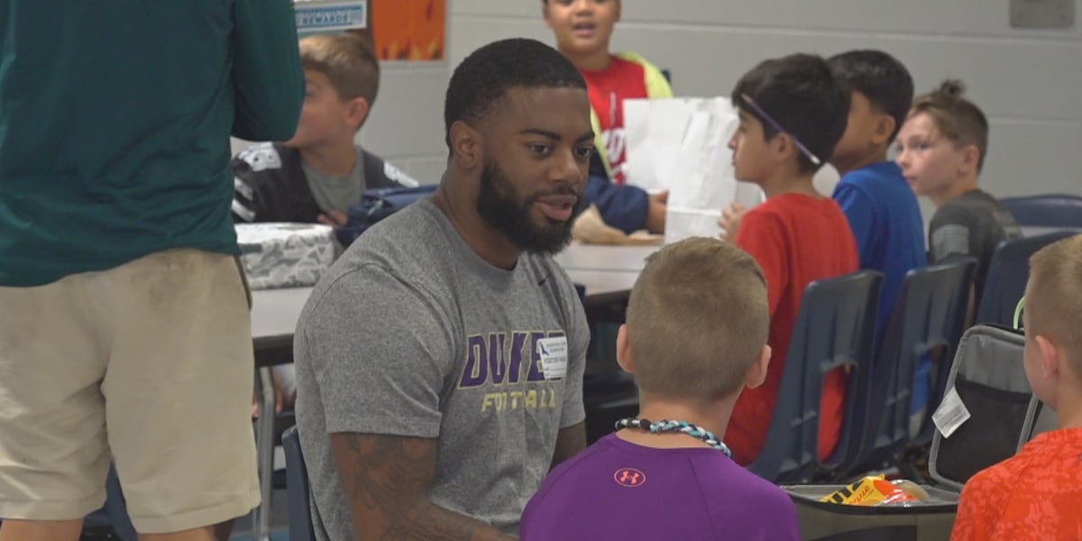 JMU football team kicks off season with visits to Rockingham County schools