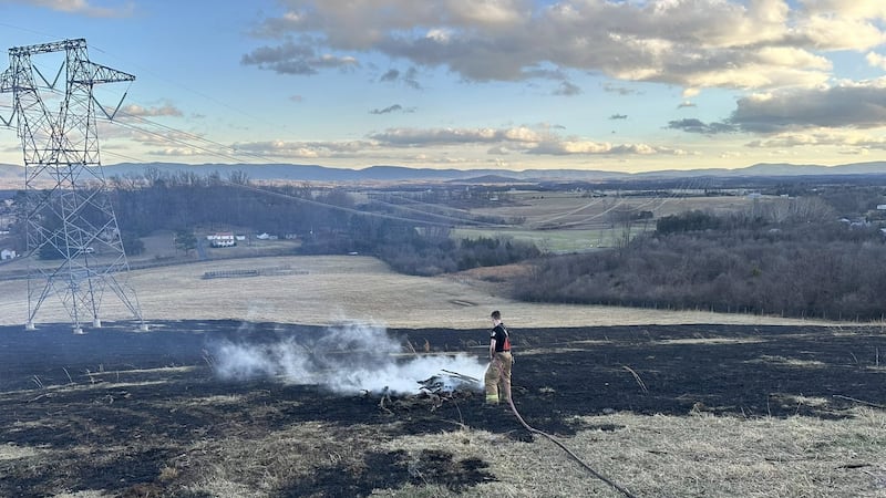 Several units work to put out a field fire in Augusta Co.
