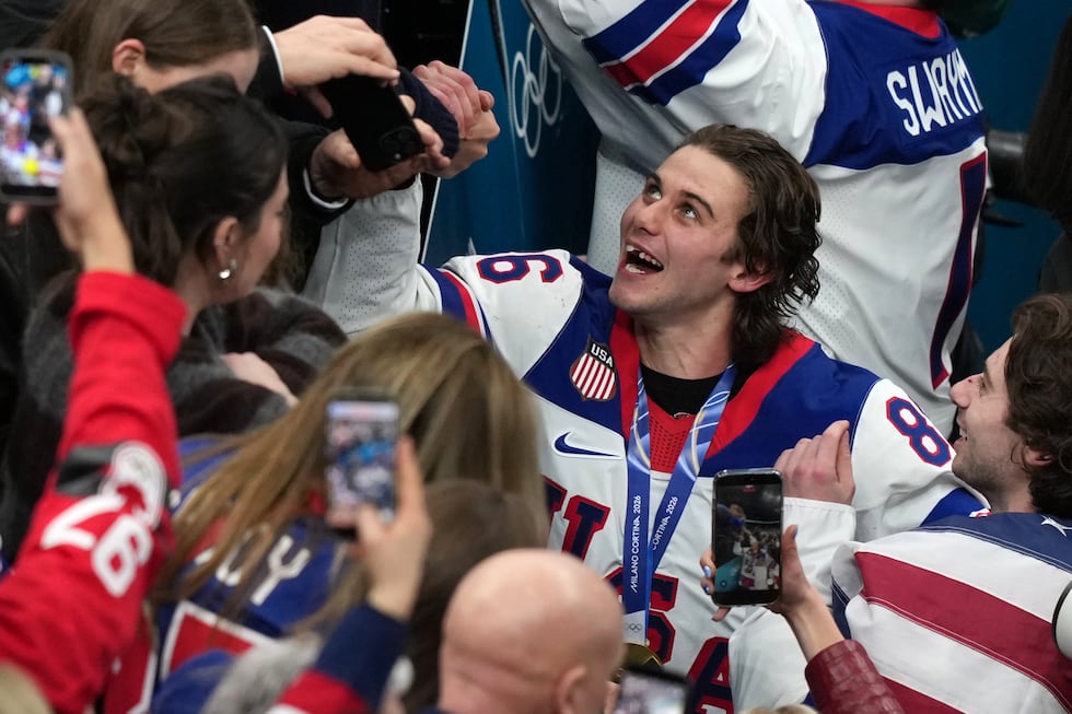 United States' Jack Hughes (86), who scored the winning overtime goal, celebrates after...