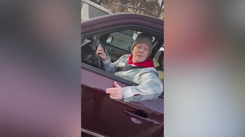 Renee Good is shown in her car before being fatally shot by a U.S. Immigration and Customs...