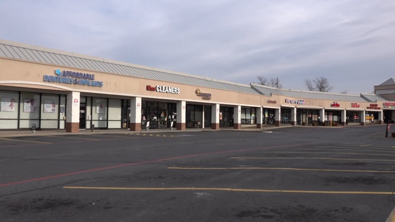 The parking lot is empty at the Spotswood Valley Square Shopping Center in Harrisonburg after...
