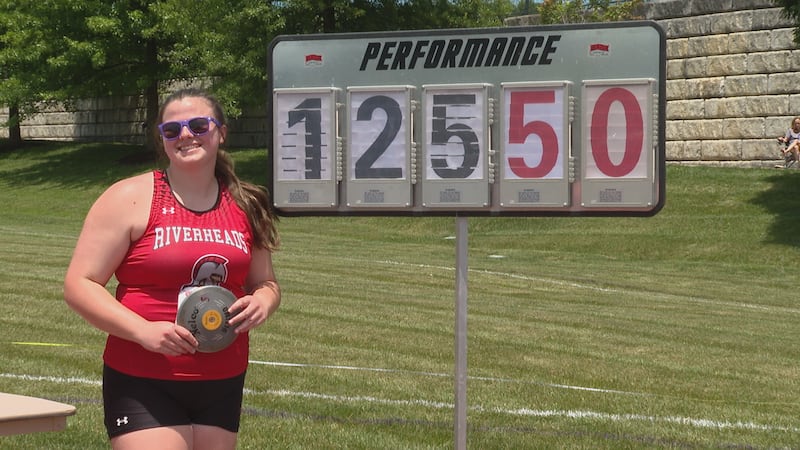 Riverheads sophomore Sarah Piner poses after winning the VHSL Class 1 girls discus