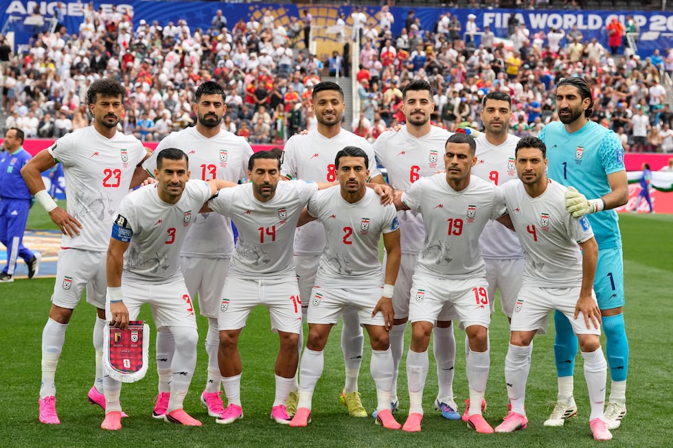 Iran team pose for a group photo prior to the World Cup Group G soccer match between Belgium...